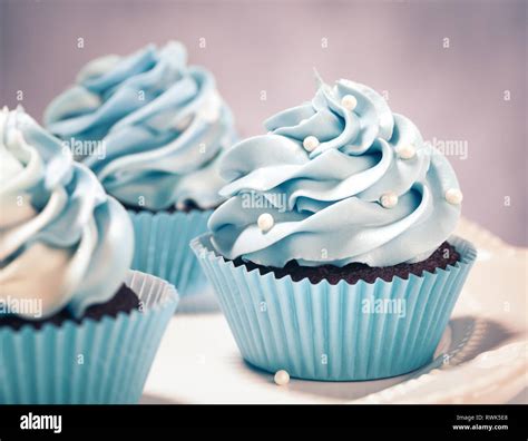 Blue Cupcakes On A Plate Vintage Style Stock Photo Alamy