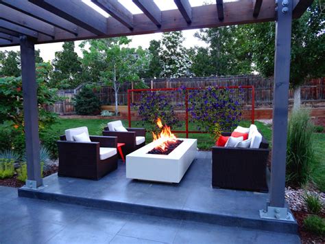 Smooth Finish Concrete Patio With Modern Fire Feature