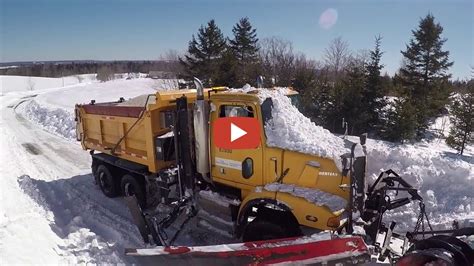 Busting Through A Giant Snow Bank In A 6x6 Western Star