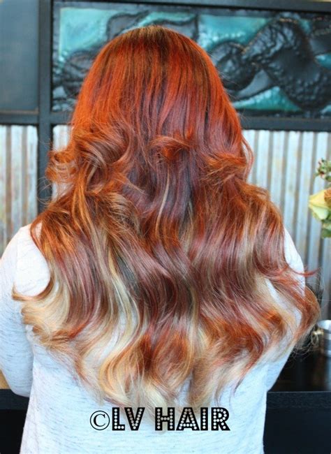 The brightness of the red looks incredible with bold blonde mixed in with highlights. Red Blonde Ombre Hair Extensions
