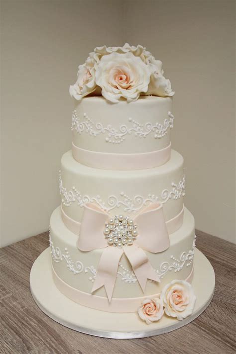 Peach Roses And Bow Wedding Cake Now022 Creative Cakes