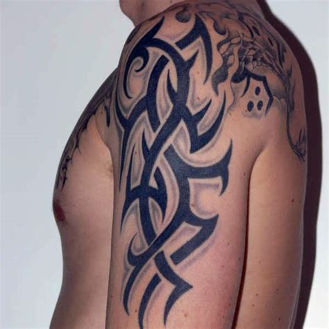 26 Exciting Tribal Tattoos For Men On Arm