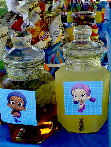 The centerpiece is made from a leftover galvanized bucket, some yarn, and some shells. Spotted Ink: A Very Bubble Guppies Birthday!