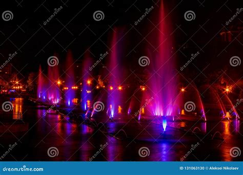 Glowing Multicolored Illumination Fountains In The Far Eastern City Of