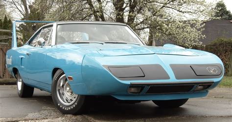this is what a sea of rare plymouth superbirds and dodge charger daytonas looks like welcome