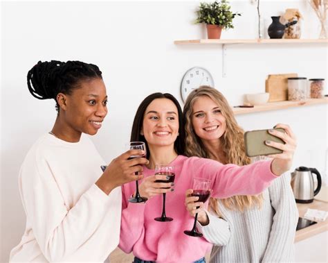 Free Photo Group Of Women Taking A Selfie Together