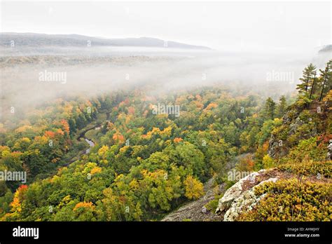 Foggy Fall Color Morning At The Lake Of The Clouds Overlook In