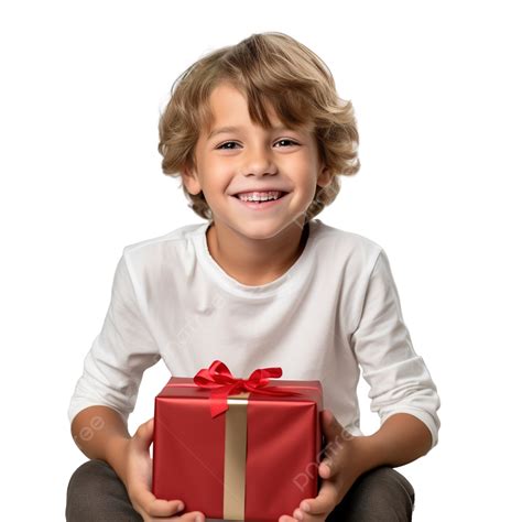 Un Niño Feliz Con Una Caja De Regalo De Navidad Sentado En Un Sofá En