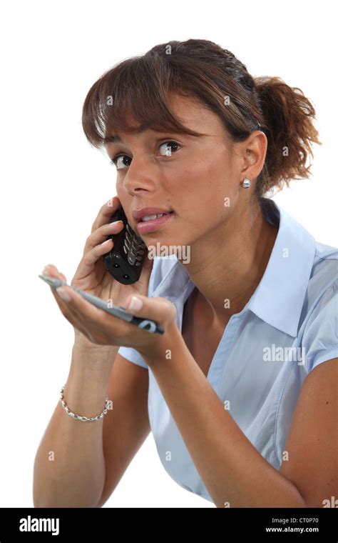 Woman Trying To Explain Something Over The Phone Stock Photo Alamy