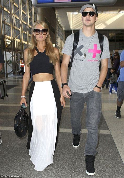 Paris Hilton Showed Off Her Toned Midriff In A Black Crop Top As She