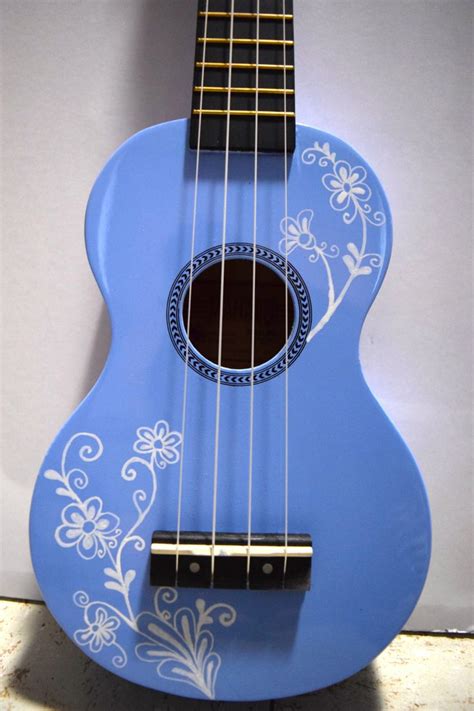 See full list on wikihow.com Soprano ukulele with hand-painted design: flowering vine ...