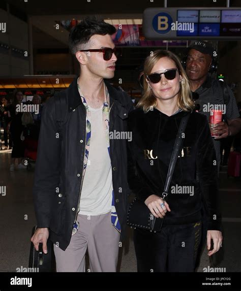 Brie Larson and her fiancé Alex Greenwald depart from Los Angeles International LAX Airport