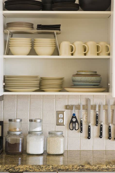 Now it's time to organize the contents of your kitchen cabinets that you're keeping. Organize your Kitchen Cabinets