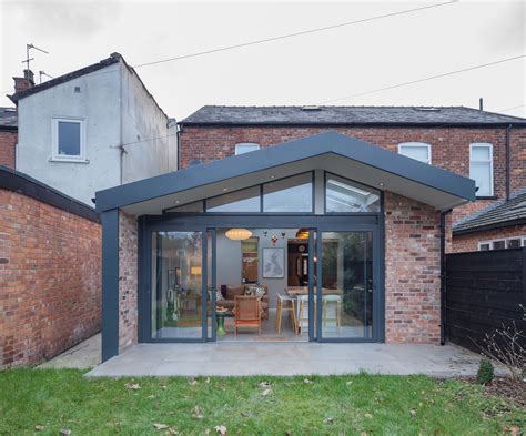 Light Filled Asymmetric Extension Brick With Aluminium Accents To The