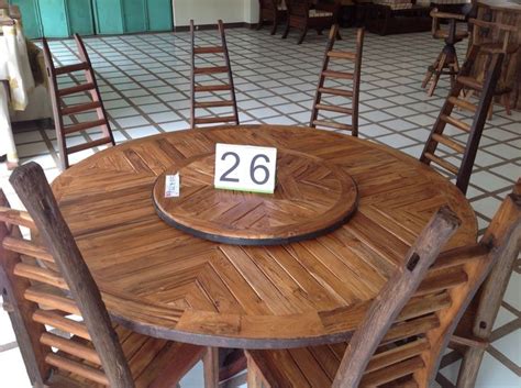 Splurge on a teak dining set to get the party started outdoors. Handcrafted reclaimed ox cart teak wood dining table with ...