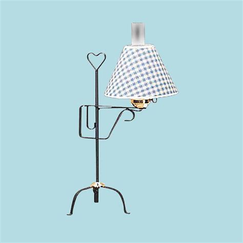 Wrought iron table lamp can be traditionally operated like any other electronics but are also available in bluetooth and other kinds of wireless options. Table Lamp Black Wrought Iron Blue Shade