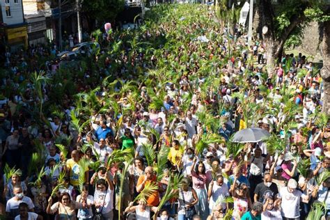 Crowds Of Catholic Worshipers Wave Palm Branches During The Palm Sunday
