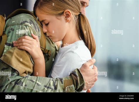 Masculine Sad Military Man Hugging Her Daughter Indoors Stock Photo Alamy