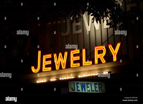 Neon Jewelry Sign Over A The Storefront Of A Jeweler Stock Photo Alamy