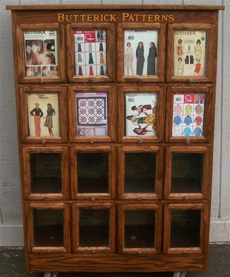 They don't work in binders, are too thick for file folders, and are too small to go in large bins. Butterick Pattern Cabinet Oak Display w/16 glass front ...