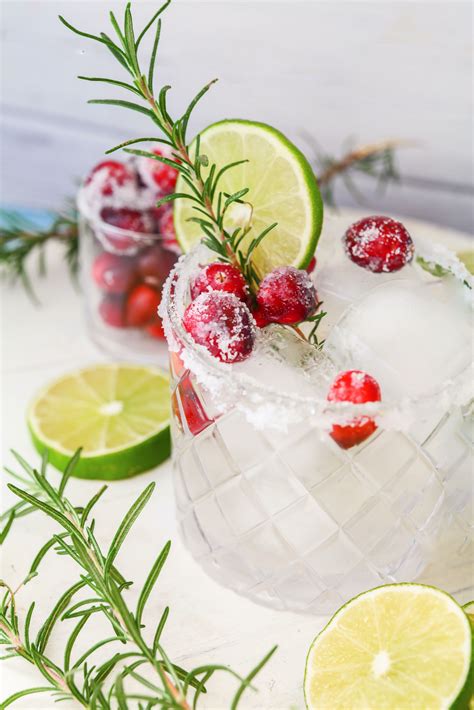 A Simple Mix Of Just Four Ingredients With A Garnish Of Glittered Cranberries And Rosemary To