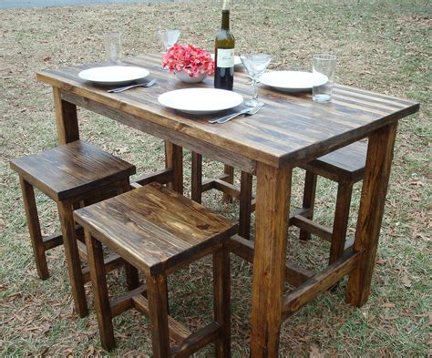 Here are some styles and color combinations that bar and counter stools that are made for the outdoors have a weatherproof finish, usually two layers or more, that coats their parts. Rustic pub table, Bar table and stools, Bar table