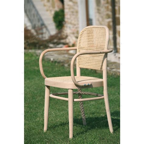 Petit fauteuil vintage datant des années 60 dans l'esprit de tobia scarpa, cadre en bois, entièrement rénové et retapissé par l'atelier vladimir boson, avec un tissu rayé de la marque toiles de. Fauteuil Retro