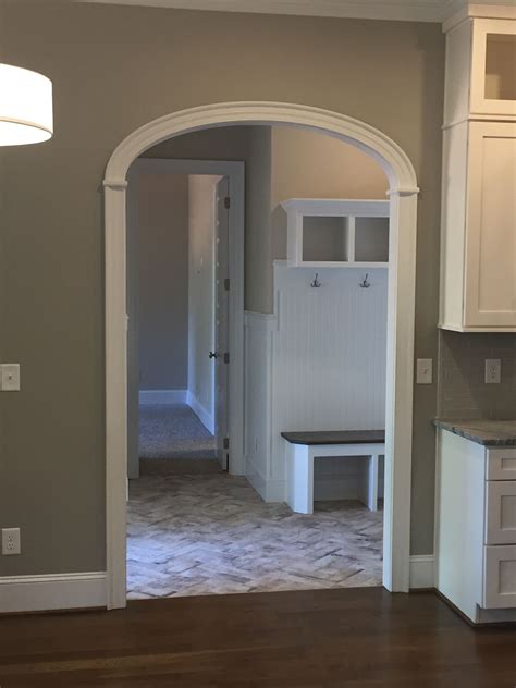 Arch Doorway In Mudroom Great Entry Point To A Large Open Kitchen Area