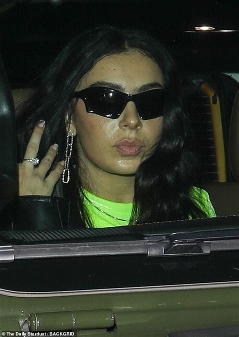 Charli Xcx Puts On A Very Leggy Display In A Neon Green Mini Dress And