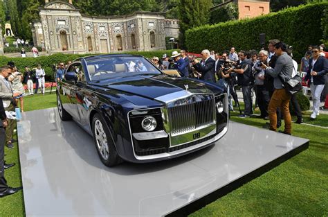 A full set of bespoke sweptail luggage fits in the trunk amid wood cladding and atop polished. Rolls-Royce evaluating options for more one-off ...