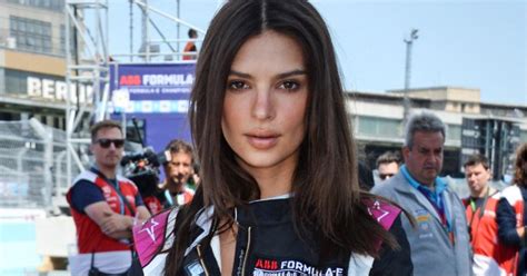 Emily Ratajkowski Stuns In Her Racing Suit As She Becomes First Female