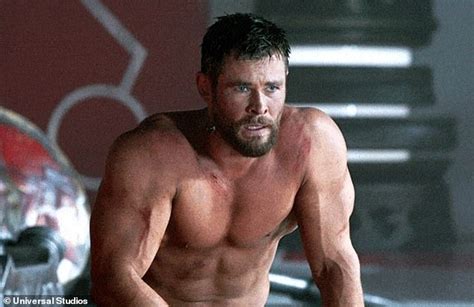 Chris Hemsworth Shows Off His Bulging Biceps In A Singlet As He Reveals