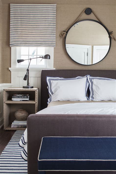 Two narrow tall mirrors and a sunburst one in the center simple narrow mirrors and a vingette framed one mirrors above the dresser. East Coast House with Blue and White Coastal Interiors ...