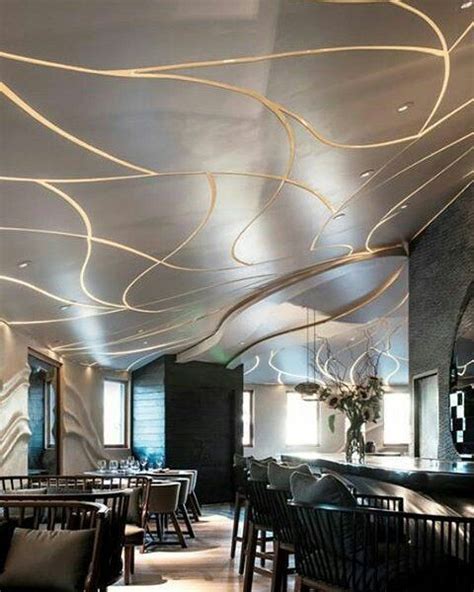 Article advice, tips for ceiling design, tips for recessed led lighting and spots from an architectural and designer point of view in order to maximise the perception of the space and to achieve clean. Nature flowing ceiling lighting. branches coves curved ...