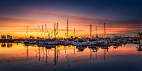 Yacht On Ocean During Sunset Hd Wallpaper Wallpaper Flare