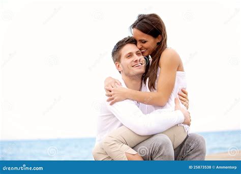 Couple Enjoying Each Others Company On The Beach Royalty Free Stock