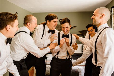 Fun Pose Idea For Groom And Groomsmen During Getting Ready Portraits