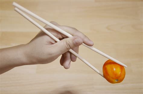Different blogs, websites and travel guides give different instructions as to how to pick up your. How to Eat with Chopsticks: 7 Steps (with Pictures) - wikiHow