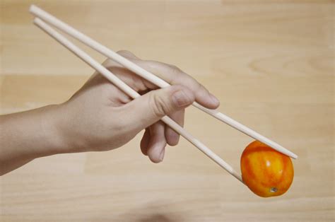 Once you have the sample food close to your mouth, eat the food you are holding in between your chopsticks. How to Eat with Chopsticks: 7 Steps (with Pictures) - wikiHow