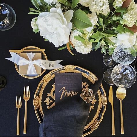 Beautiful gold and copper fall table setting. TheBridalCircle® | Sade Awe on Instagram: "Black and gold ...