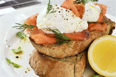 Image Of Breakfast Of Smoked Salmon Poached Eggs And Bread Austockphoto