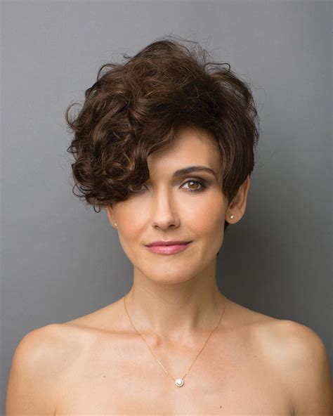 Dramatic Tapered And Asymmetric Style With Curly Layers That Gradually