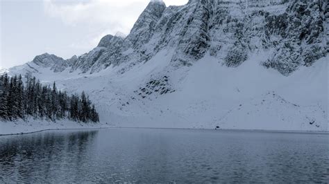 Download Wallpaper 1366x768 Lake Mountain Snow Winter Landscape