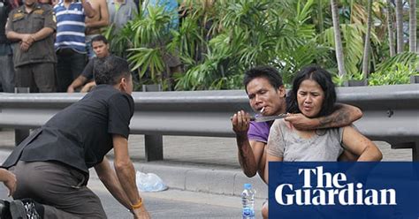 thai man holds wife hostage at knifepoint in pictures world news the guardian