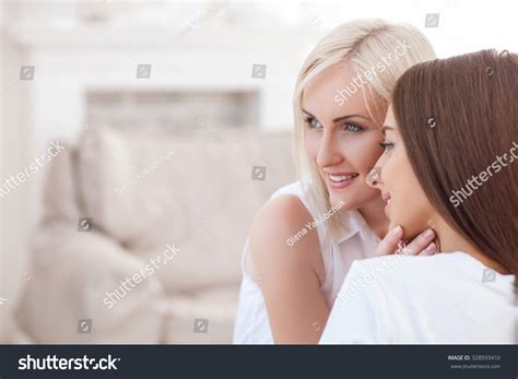 Loving Lesbian Couple Is Relaxing At Home They Are Sharing Their Love