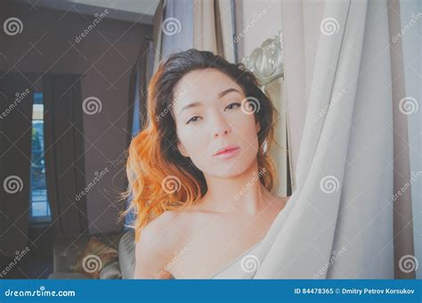 Beautiful Girl In The Hotel Room In A Revealing Dress Stock Image Image Of Lifestyle Happy