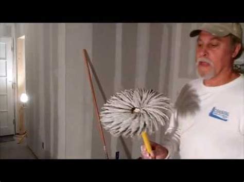 This method works well to get the ceiling mostly flat. How to apply drywall stomp texture to ceiling - YouTube