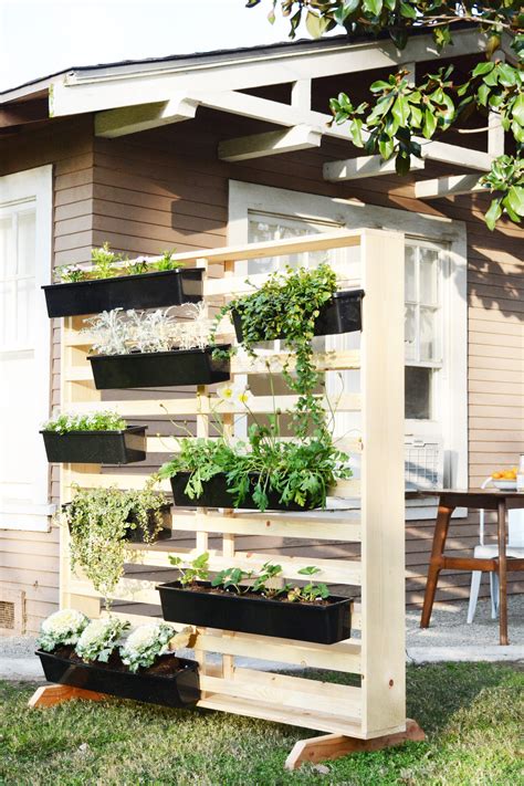 Vertical Living Wall with Moveable Planters | Vertical herb garden, Vertical garden diy ...