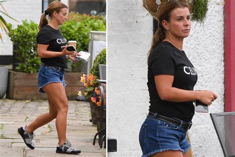 Coleen Rooney Shows Off Her Barbados Tan As She Arrives Home In Cut Off Denim Hotpants