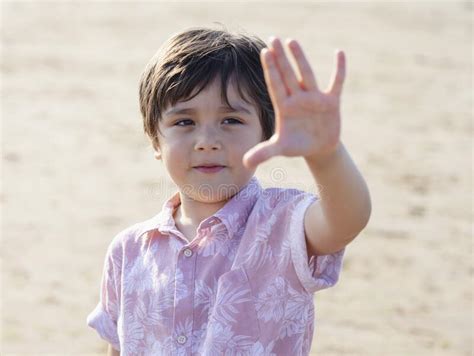 Selective Focus Of Little Boy Showing Five Fingers Portrait Kid